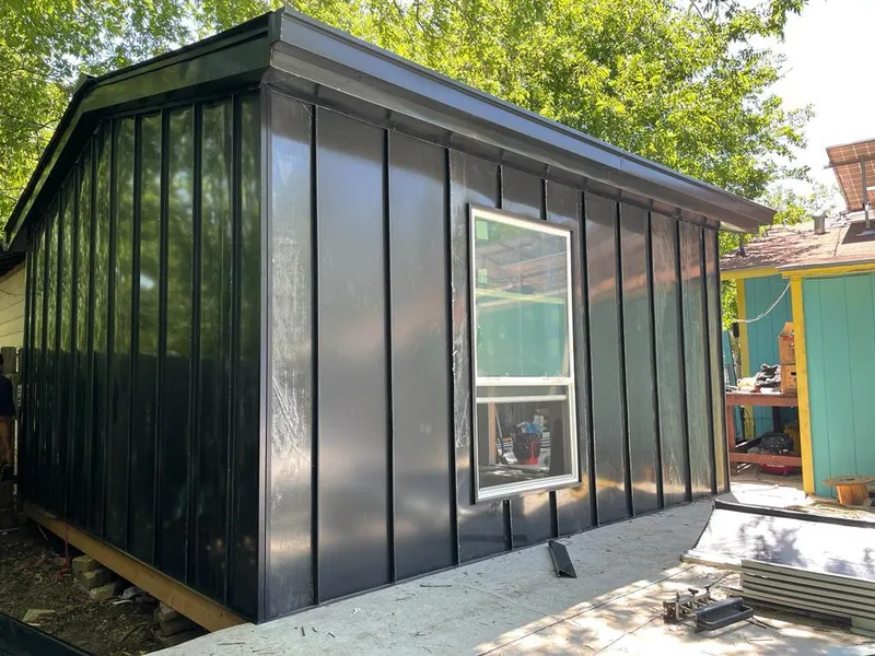 Black standing seam metal wall panels for Metal Roof Installation in Ambridge