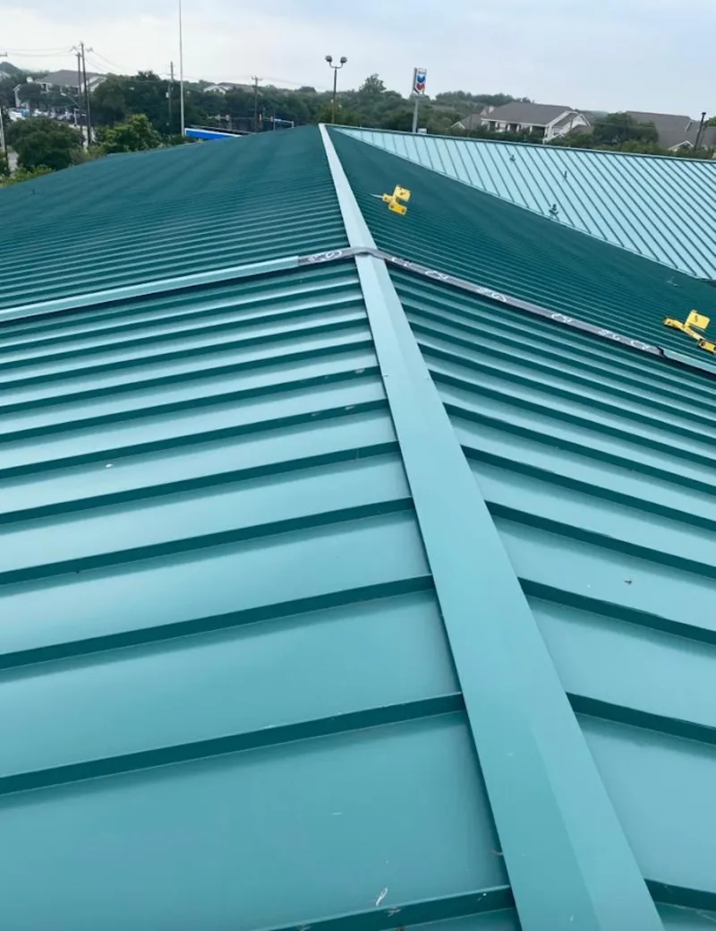 Green commercial metal roof ridge and valley for Metal Roof Repair in Ambridge